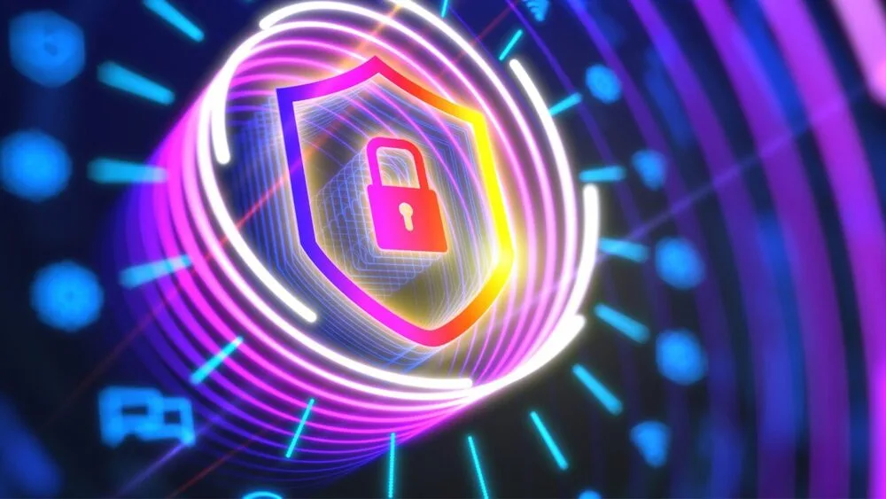 A neon-colored security concept image featuring a glowing shield with a padlock icon at the center, surrounded by circular, swirling lines and digital patterns, representing cybersecurity or data protection.