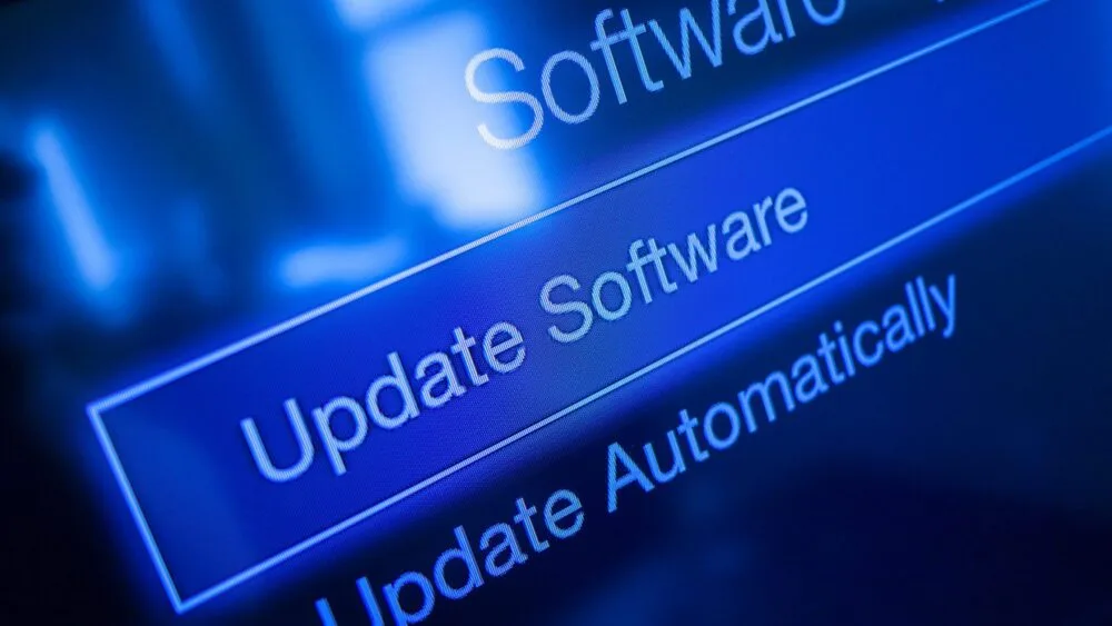 Close-up of a digital screen displaying options for "Update Software" and "Automatically."