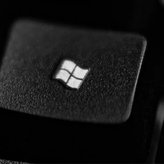 Close-up of a black keyboard key with the Microsoft Windows logo on it.